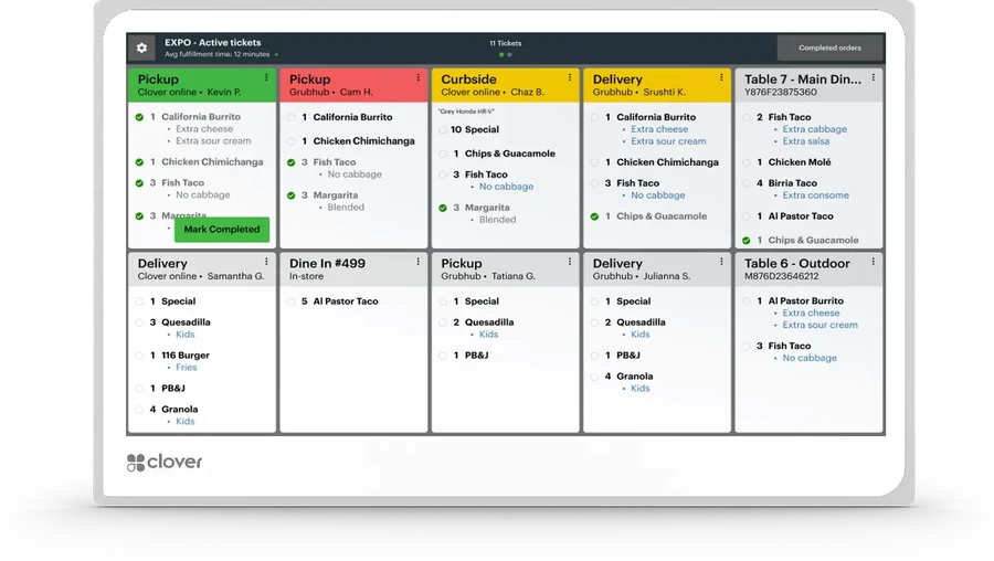Clover KDS kitchen display showing active dine-in, pickup, curbside and delivery tickets with item modifiers